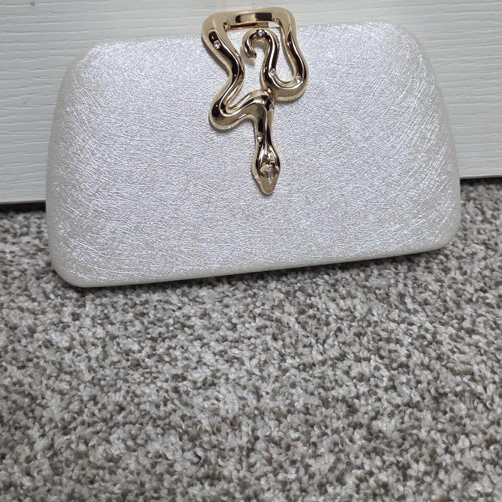 Elegant White Clutch with Gold Accent